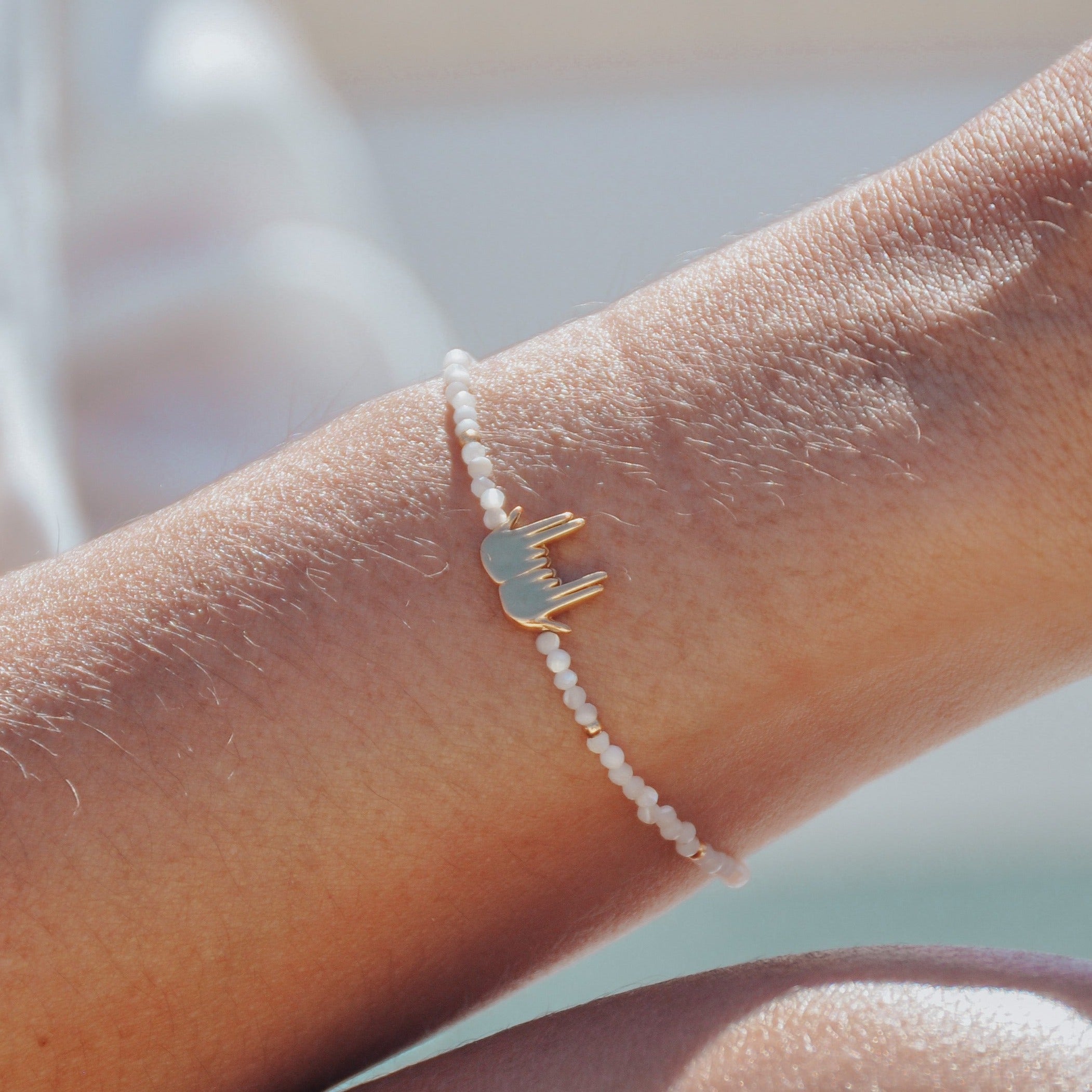 Bracelet nacre et signe jul 