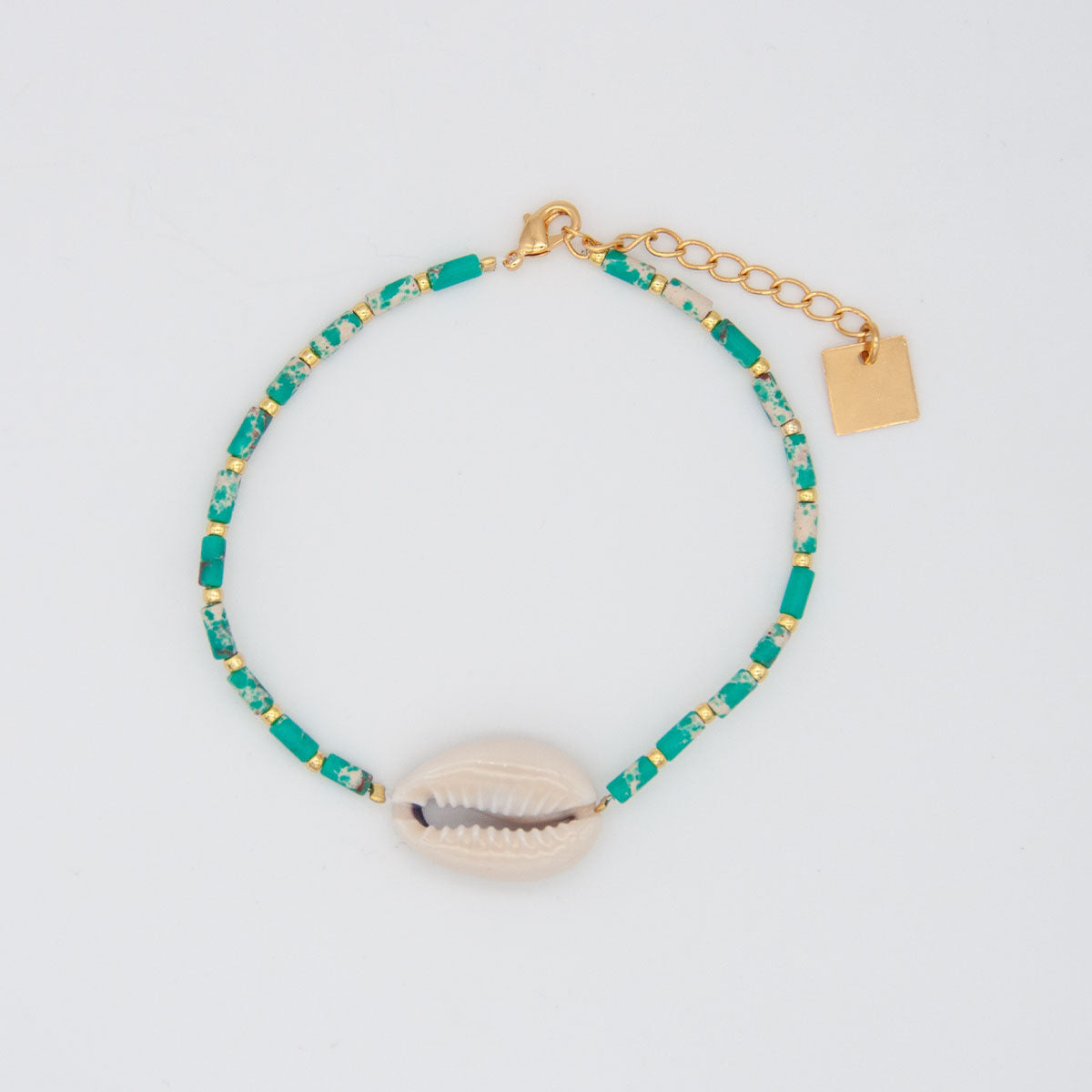 Bracelet pierres turquoises et coquillage manège à bijoux