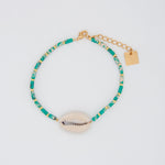 Bracelet pierres turquoises et coquillage manège à bijoux